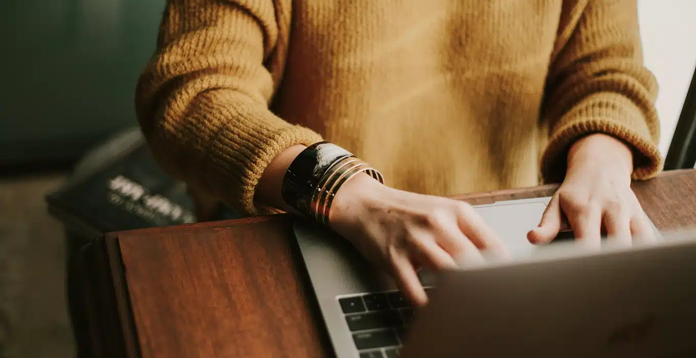 Laptop setup for remote therapy, symbolizing TherapyHive’s flexible practice model.