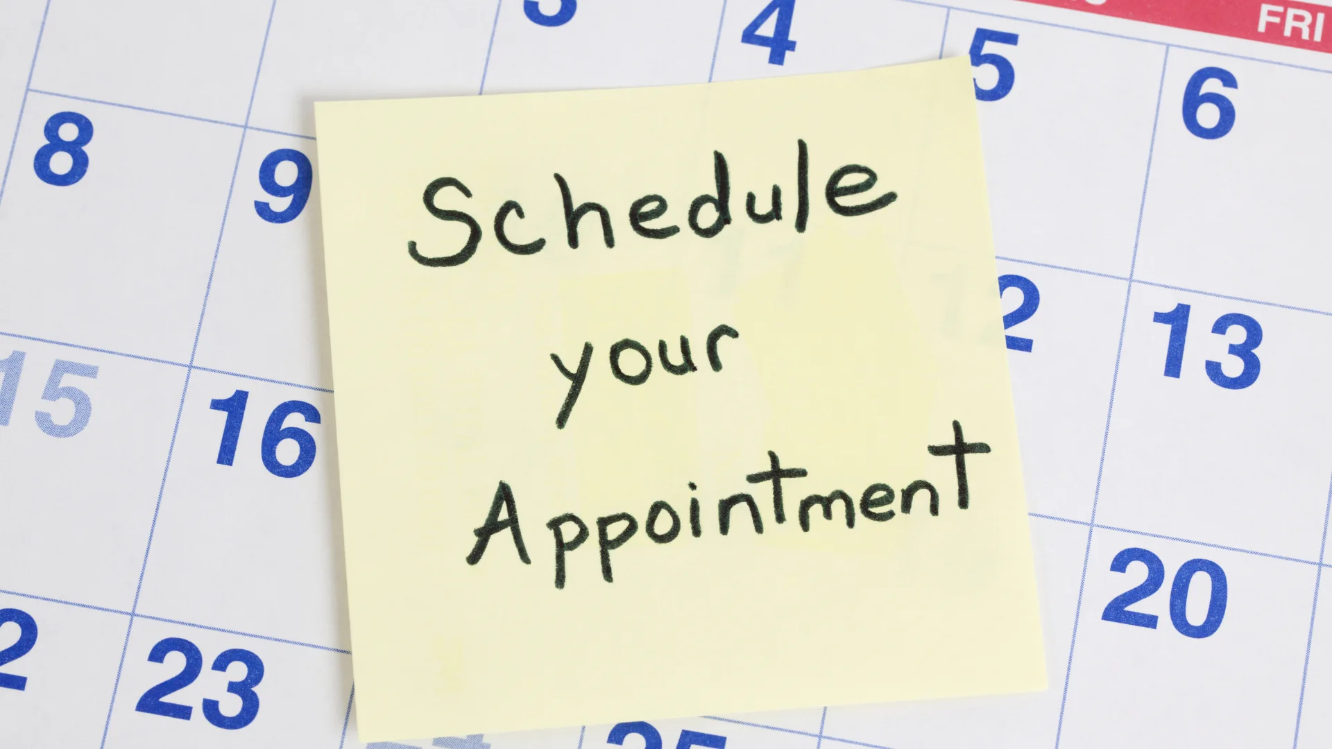 Therapist reviewing appointment schedules in a New York practice while managing minimum booking time requirements.